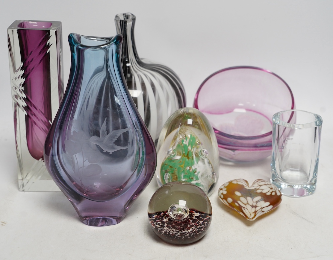 A group of ornamental coloured glass vases and paperweights including Murano, largest 22cm high (8). Condition - good